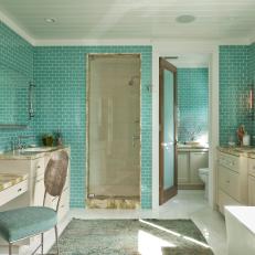 Blue Master Bathroom With Tile Walls