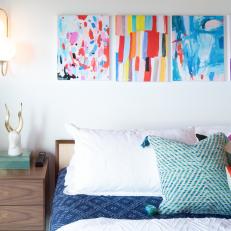 Multicolored Eclectic Bedroom With Bright Art