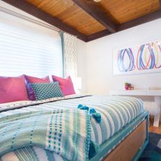 Multicolored Bedroom With Blue Bed