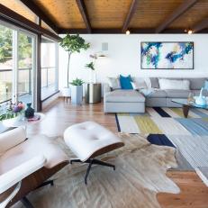 Midcentury Modern Living Room With Animal Skin Rug
