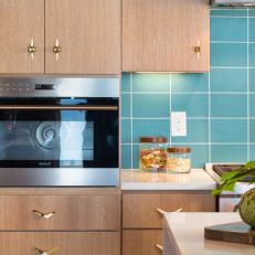 Midcentury Modern Kitchen With Blue Backsplash