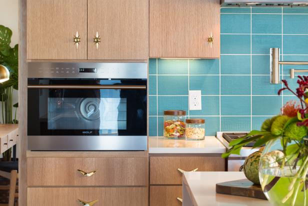 Midcentury Kitchen With Blue Backsplash