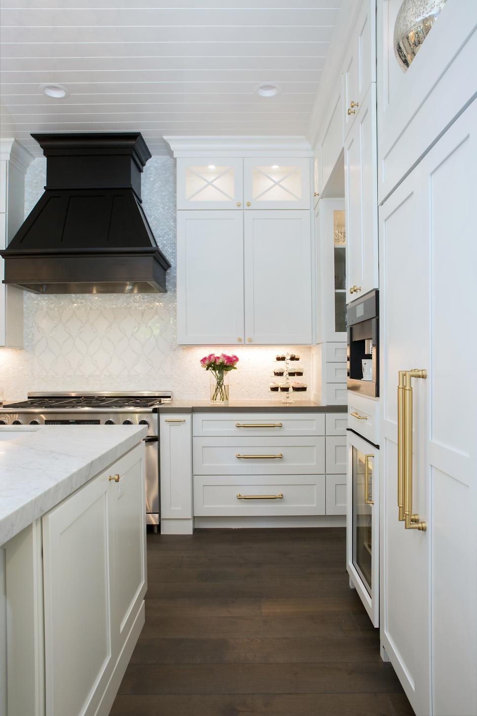 White Chef Kitchen With Gold Pulls | HGTV