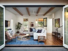 Living Room With Blue Rug