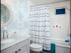 Kids Bathroom With Striped Curtain