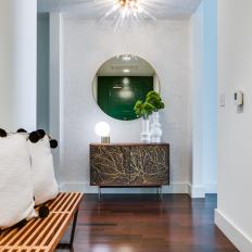 Contemporary Foyer With Big Round Mirror