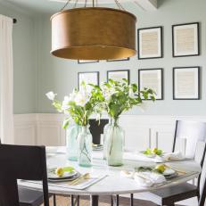Traditional Green Dining Room with White Wainscoting 