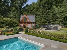 Backyard Includes Charming Greenhouse 