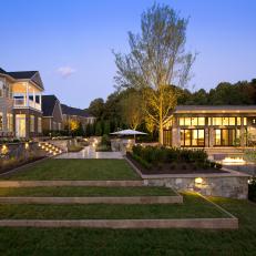 Terraced Travertine Deck Leads to Pool House