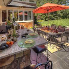 Outdoor Kitchen Pairs Well With Dining Table