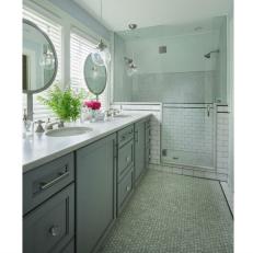 Blue Master Bathroom With Pink Flowers