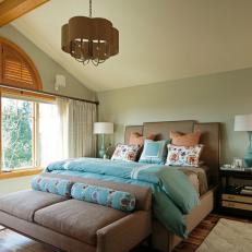 Blue Transitional Bedroom With Arched Shutters