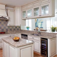 Traditional Kitchen With Blue-Checked Backslash