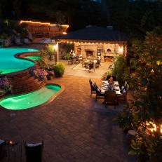 Luxury Backyard at Night With Pools