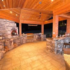 Outdoor Kitchen Pairs Wood Beams, Stone Accents