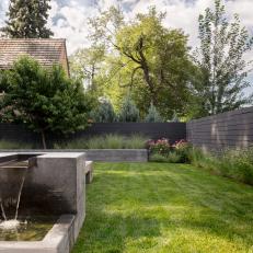 Fence, Fountain Complement Home's Modern Style