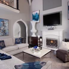 Blue and Gray Art Deco Living Room With Urns
