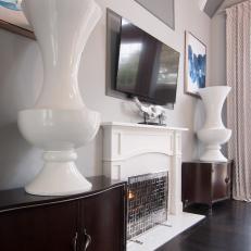 Fireplace and White Urns
