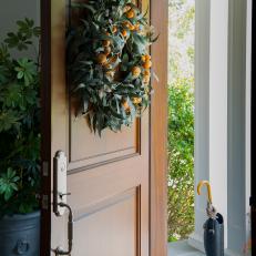 Front Door and Wreath With Oranges