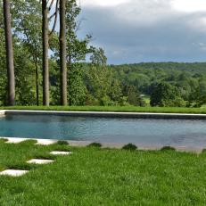 Swimming Pool Highlights Home's Rolling Hills