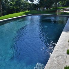 Sight Lines from Swimming Pool Create Unity Between Outdoor Spaces