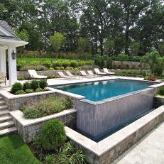 Beautiful Backyard with Infinity Edge Swimming Pool and Dual Level Entertaining Spaces