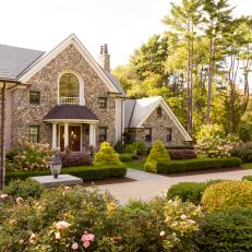 Trimmed Hedges and Trees Create Enchanting Entry