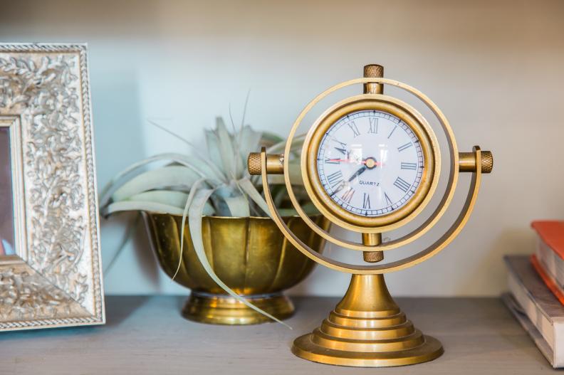 Be sure to include functional items on shelves, too. A retro fan, small lamp or clock is visually interesting AND serves a purpose, rather than being pure eye candy.