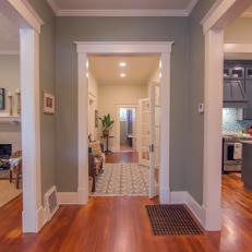 Contemporary Gray Foyer with Neutral Pine Floors 
