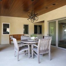 Neutral Patio with Warm Wood Paneling 