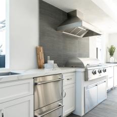 Open Kitchen Shines With Stainless Appliances