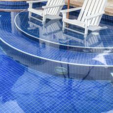 Stylish White Lounge Chairs in Pool