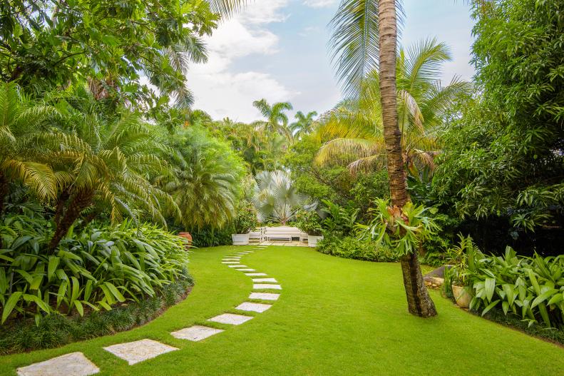 tropical garden with sitting area