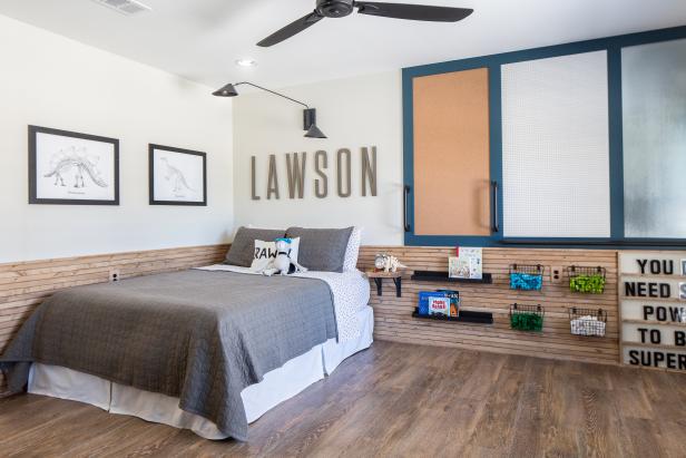 Lawson's bedroom in the Copp's remodeled home has new hardwood flooring, skinny lap, and sleek hand rails, as seen on Fixer Upper. (after)