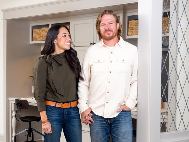 Chip and Joannes Gaines in the entryway of the Copp's newly remodeled home, as seen on Fixer Upper.
