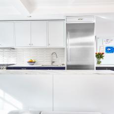 White Open Plan Kitchen With Navy Lower Cabinets