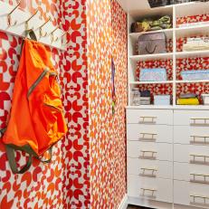 Kid's Closet With Red and White Wallpaper