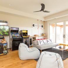 Contemporary Game Room With Arcade Games