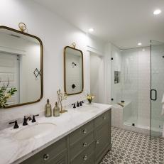 Gray and White Cottage Bathroom With Gold Mirrors
