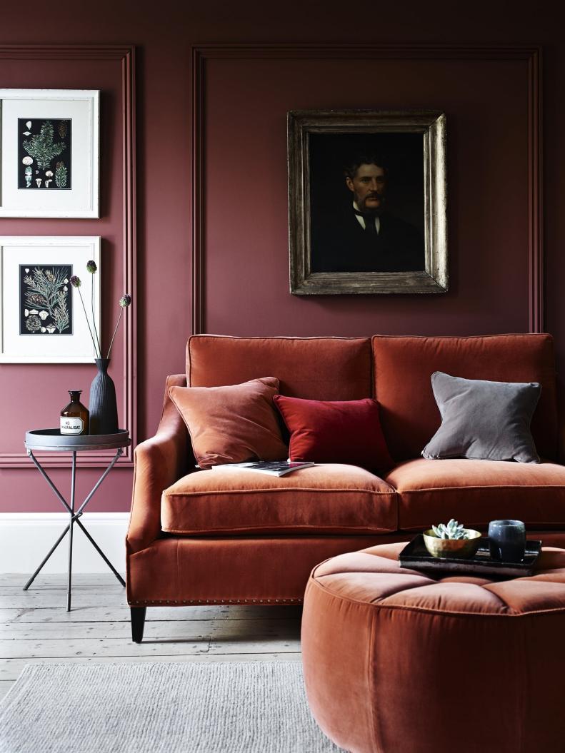 Contemporary Living Room with Velvet Sofa and Ottoman