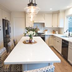 White Chef Kitchen With Large Island