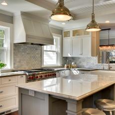 White Cabinets and Gray Marble-Topped Island in Elegant, Open Plan Kitchen 