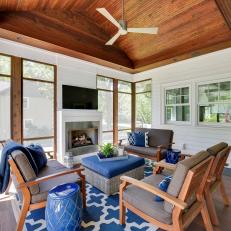 Warm Wood Adds Warm Contrast to Blue and White Outdoor Living Room 