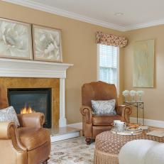 Neutral Contemporary Family Room With Fireplace And Leather Chairs