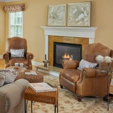 Family Room With Neutral Color Palette And Traditional Fireplace