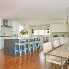 White Cottage Open Plan Kitchen With Blue Barstools