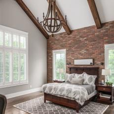 Neutral Master Bedroom With Exposed Brick