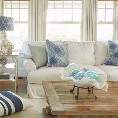 Blue and White Coastal Living Room With Glass Balls
