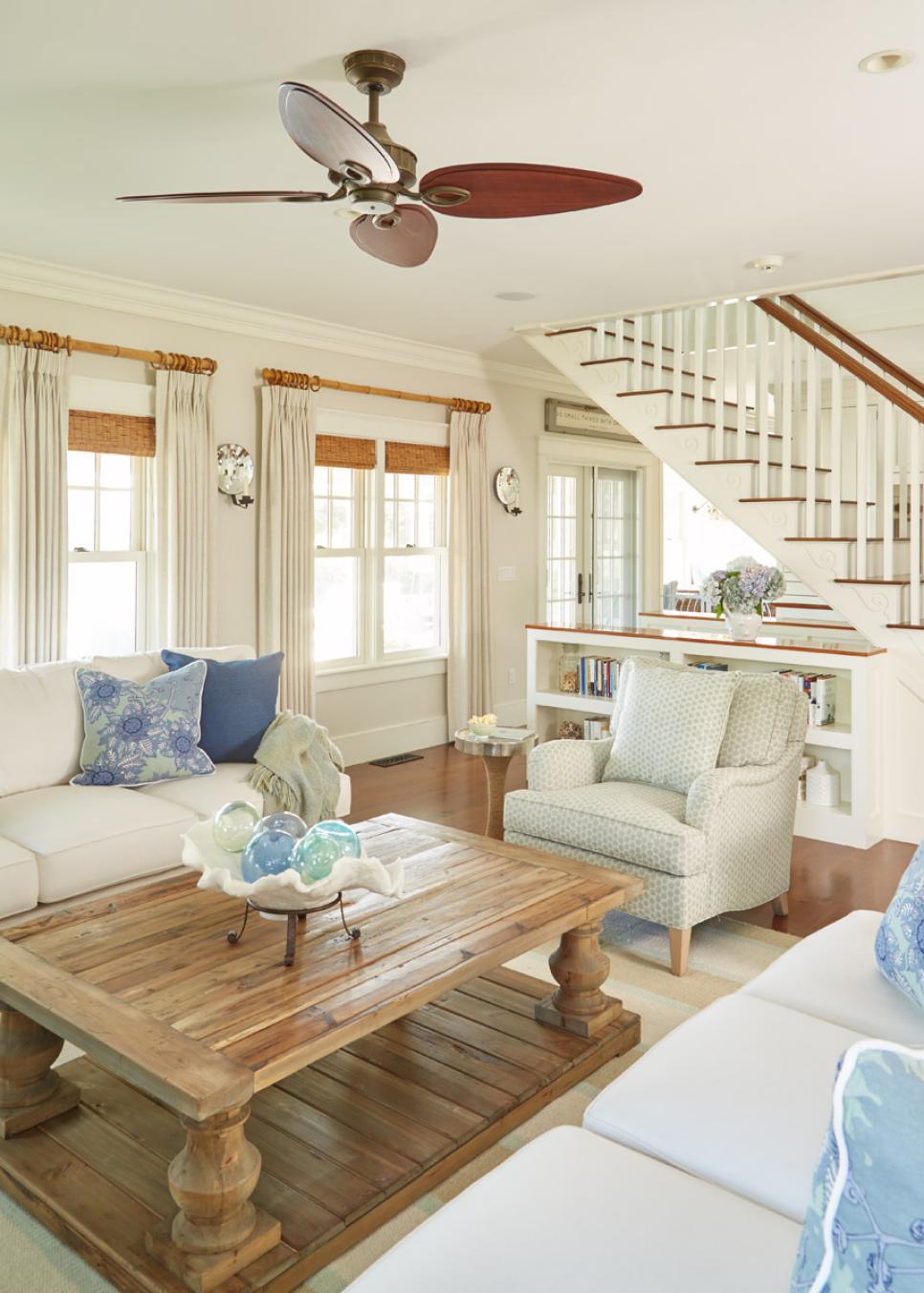 White Coastal Living Room With Stairs | HGTV