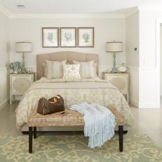 Neutral Coastal Bedroom With Coral Art